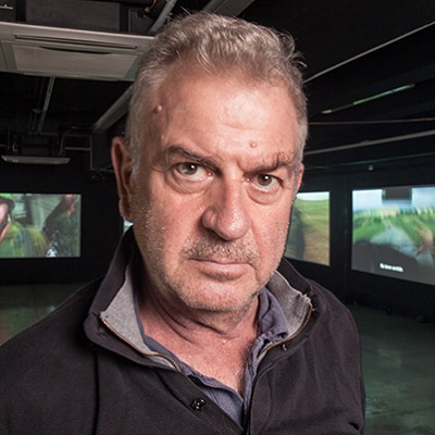 headshot photo of Avi Mograbi by Jose Kattan