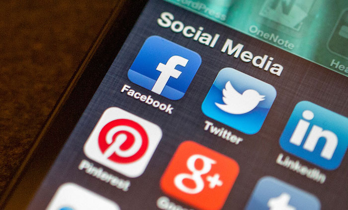 Social media app icons on an iPhone