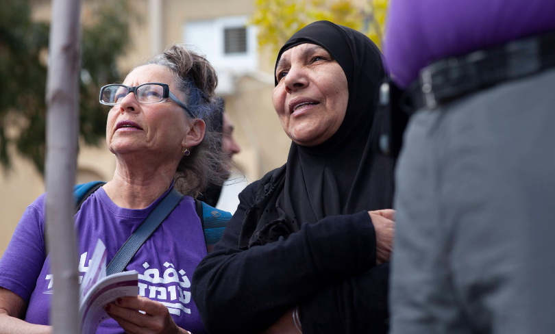 An Arab and Jewish women at a Standing Together protest