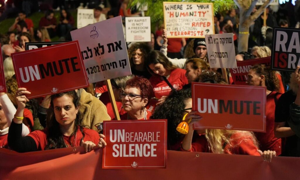 Protestors demonstrate against sexual violence in the wake of the October 7 attacks