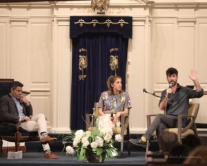 Sally Abed and Alon-Lee Green speak with Mickey Gitzin on stage at Sinai Brookline