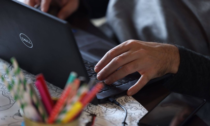 A person works at a computer