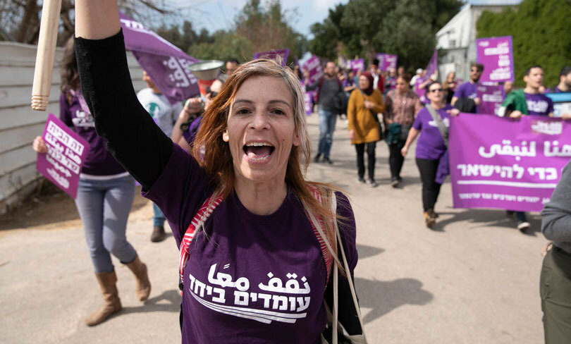 Standing Together activists march for peace