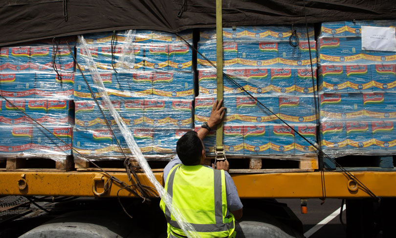 Aid is loaded on a truck bound for Gaza