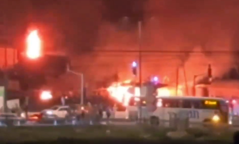 A Palestinian village burns after a settler attack in the West Bank