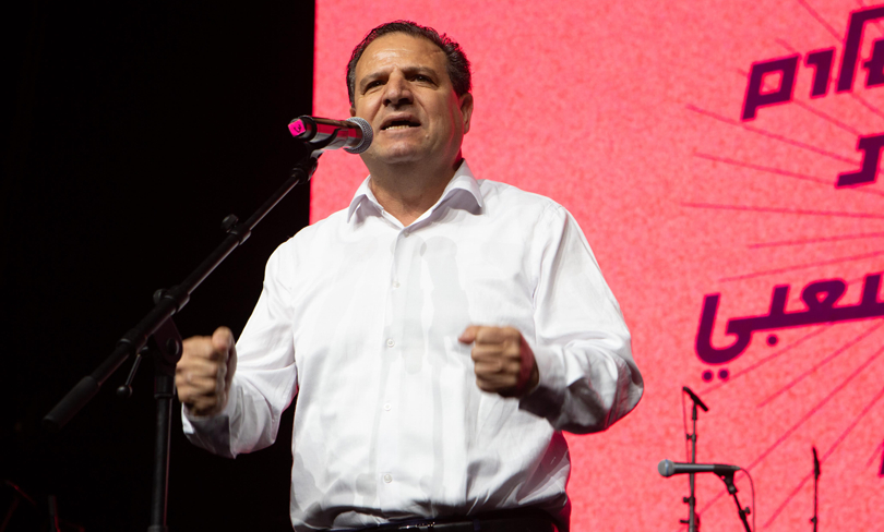 Member of Knesset Ayman Odeh speaks from the stage at the It's Time Peace Summit in 2025