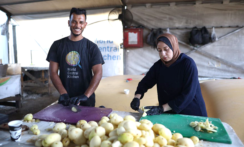 World Central Kitchen volunteers prepare food at a kitchen in Gaza